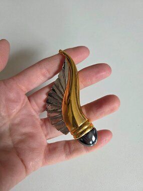 Vintage 1980s Butler oversized gold silver tone black Hematite accents brooch.